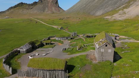 Marvel-at-the-striking-contrasts-of-land-and-sea-in-the-Viking-Village,-beautifully-captured-from-above