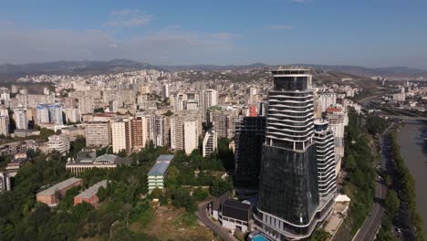 Beautiful-Drone-Shot-Above-Old-Tbilisi-Apartment-Buildings,-City-Skyline