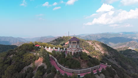 Archbishop-makarios-iii-tomb-in-cyprus-surrounded-by-scenic-mountain-landscape-,-aerial-view