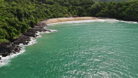 Aerial-Shot-Turning-Towards-an-Island-Bay