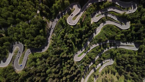 Switzerland-Scenic-alpine-mountain-road-S-reverse-curve-infrastructure-aerial