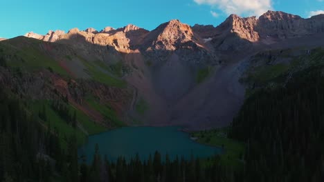 Lower-Blue-Lake-Mount-Sneffels-Wilderness-Ridgway-Telluride-Colorado-aerial-drone-sunset-dusk-golden-hour-shaded-peaks-San-Juan-Rocky-Mountains-Uncompahgre-National-Forest-blue-sky-circle-left