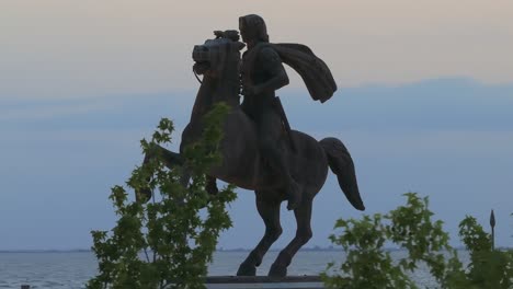 Alexander-the-Great-statue-in-Thessaloniki-behind-trees