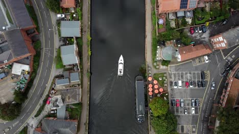 Bird-Eye-aerial-footage-following-a-River-Boar-in-Newark-along-the-River-Trent