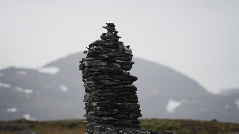 A-dark-stone-cairn-in-the-bleak-northern-landscape