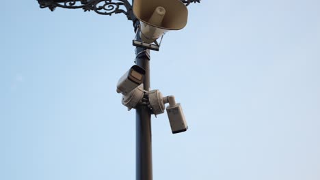 CCTV-Cameras-mounted-on-street-pole,-for-public-safety-in-European-city