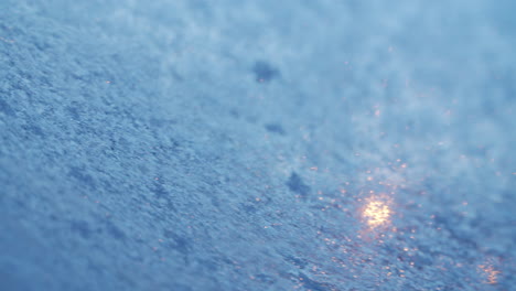 Early-morning-frosted-car-window-texture.-4k