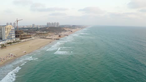 Drone-shot-of-the-shore-near-a-construction-site