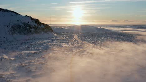 Bright-sunshine-illuminates-volcanic-snow-covered-landscape-on-Reykjanes-Peninsula