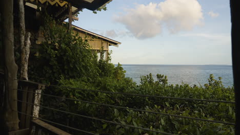 Hand-held-shot-looking-out-onto-the-Bohol-Coast-from-a-seafront-villa