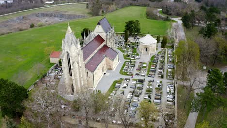 Aerial-View-Of-Karner-Church-And-Graveyard-In-Bad-Deutsch-Altenburg,-Lower-Austria
