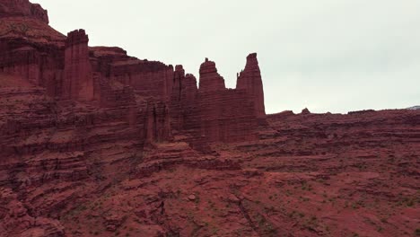 Fisher-Towers-Red-Rock-Formation-Near-Moab,-Utah,-USA---aerial-drone-shot