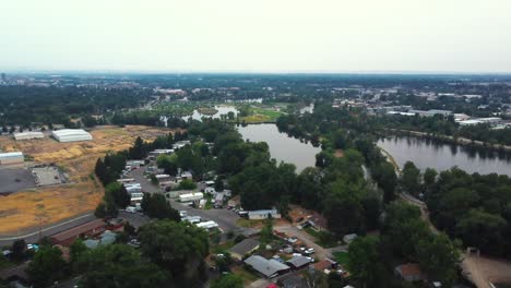 Aerial-View-Of-Creek,-Boise-Cascade-Lake,-And-Boise-River-From-Veterans-Memorial-Park-In-Idaho