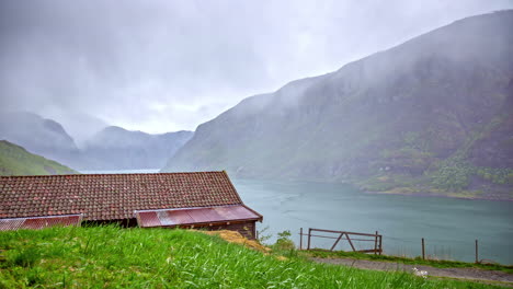 Powerful-rainstorm-weather-over-the-fjord---time-lapse