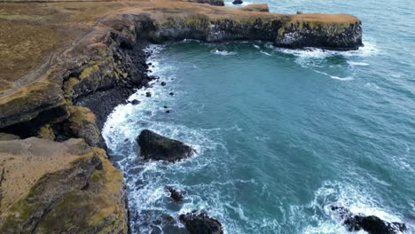 Wild-Atlantic-Coast-of-Iceland,-Aerial-Reveal-Tilt-Up