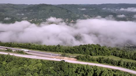 Hyperlapse-video-of-clouds-and-fog-along-with-traffic-on-Interstate-75-near-Jellico,-Tennessee-in-the-Cumberland-Mountains-with-drone-video