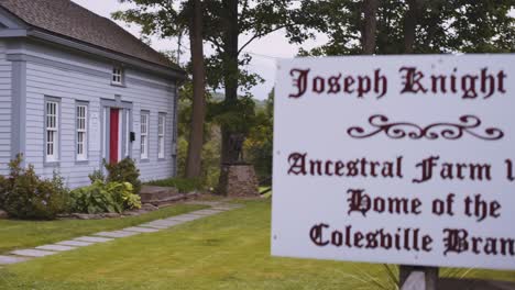 Sign-in-the-front-marking-the-Home-of-the-Knights,-Joseph-Sr-and-Newel-Knight-and-the-place-of-the-first-branch-of-the-church-of-Christ,-Mormons-located-in-Colesville,-New-York-near