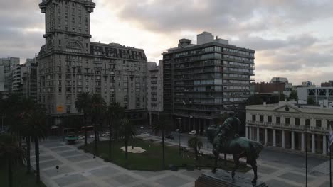 aerial-view-of-Plaza-Independencia-most-important-city-square-in-Montevideo,-Uruguay-at-sunset
