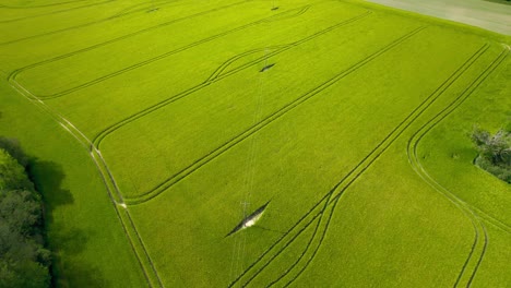 Vivid-green-meadow-landscape-of-France,-aerial-drone-view
