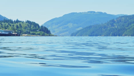 Panoramic-Lakeside-Landscape-With-Sea-Water-Ripples-and-Mountain-in-Horizon,-Port-Alberni-British-Columbia-Canada