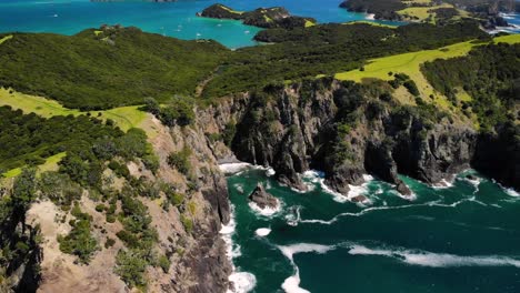 Rocky-cliffs-on-Urupukapuka-Island-coastline-aerial-look-down