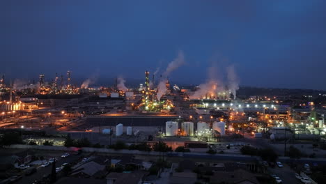 San-Pedro,-California's-industrial-port-at-nighttime---aerial-view