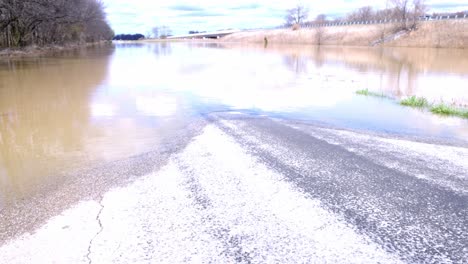 Rural-southern-Indiana-flood-damage-with-gimbal-video-panning-left-to-right-low-close-up