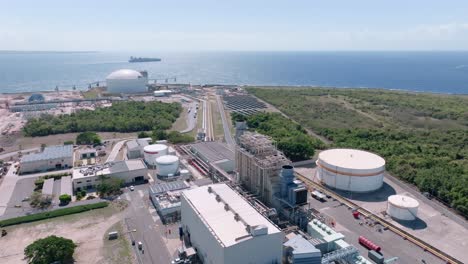 Natural-gas-storage-tanks-in-the-port-of-the-Dominican-Republic,-aerial-orbit