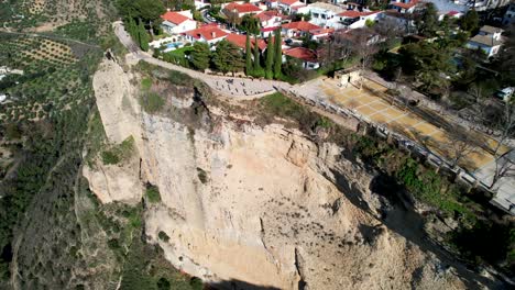 A-drone-lands-on-a-huge-cliff-in-Ronda,-Spain