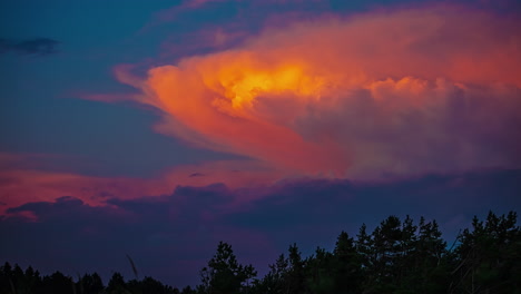 Timelapse-of-fiery-orange-clouds-change-to-white
