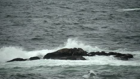 Waves-Crashing-on-Rocks-in-Sea.-Slow-Motion