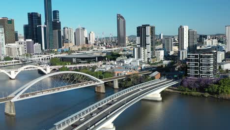Aerial-shot-flying-backwards-of-Brisbane-Go-Between-Toll-Bridge