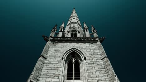 The-Marble-Church-steeple,-Bodelwyddan,-Wales---Neo-Gothic-dark-and-moody-ariel-drone-rise-up-and-reveal,-sad-story---June-23