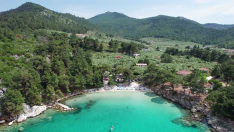 Top-Down-View-Over-Glifoneri-Beach-With-White-Sand,-Turquoise-Water-And-Lush-Vegetation,-Thassos-Island,-Greece,-Europe