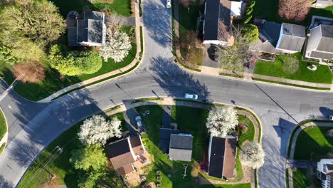 Top-down-aerial-shot-of-neighborhood-during-spring