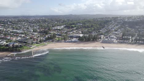 Aerial-View-Of-Collaroy-Beach-And-Rock-Pool-In-Sydney,-Australia---drone-shot