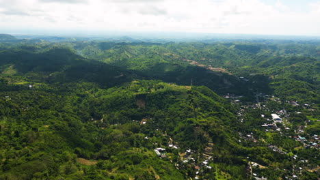 Aerial-flying-over-green-hills-of-Mandalika,-Kuta,-Lombok