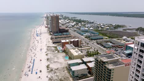 Gulf-Shores,-Alabama-skyline-and-beach-with-drone-video-moving-close-up