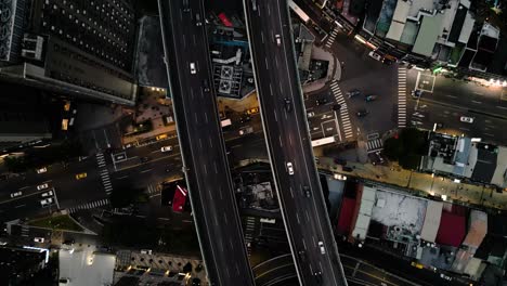 Elevated-Highway-and-Multiple-Busy-Crossing-Roads-in-Xindian-District-at-Night-Taiwan-Taipei-Aerial-Birdseye-View,-Busy-Crowded-Dense-City