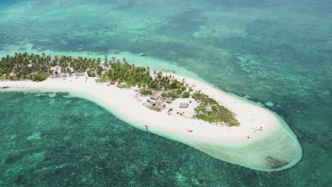 Panoramic-aerial-overview-of-luxury-Canimeran-balabac-island,-palm-trees-and-sandy-beach