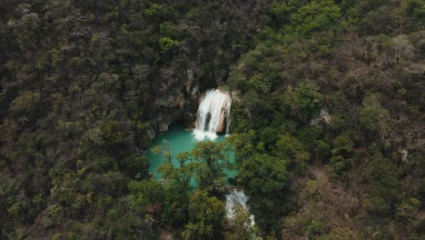 Aerial-shot-Discovering-Blue-waterfalls-of-El-Chiflon-in-Mexico