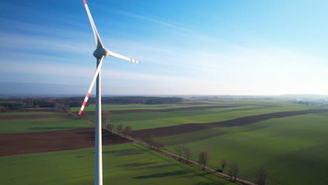 Wind-Turbine-Propeller-Rotating-Over-Rural-Fields