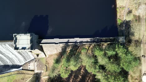 Top-down-aerial-sliding-shot-of-the-Derwent-Dam,-home-of-the-Dam-Busters-practice-during-the-second-world-war