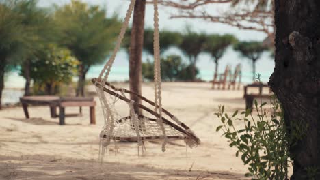 Hipster-beach-swing-in-the-summer,-isolated-swing-in-the-beach-with-no-people-during-the-day