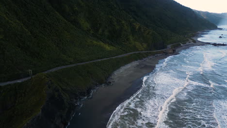 New-Zealand-Coastal-Highway:-A-scenic-road-winds-along-the-western-shore-of-New-Zealand's-South-Island