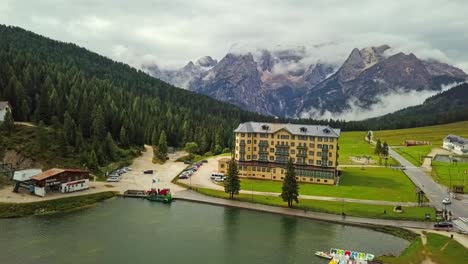Aerial-drone-footage-of-lake-Misurina-located-in-province-of-Belluno,-Veneto-in-Italy