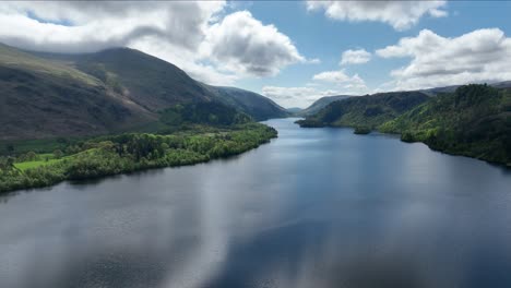 Glistening-waters-of-Thirlmere-lake,-opening-shot-of-the-Lake-District,-England
