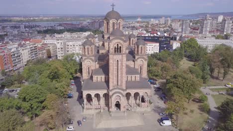 Fantastic-descending-4k-aerial-shot-of-St-Mark-Church-in-Belgrade-city-centre,-sunny-summer-day