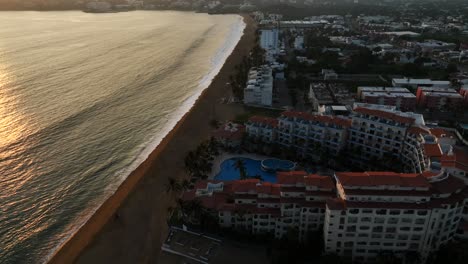 Aerial-View-Of-Condominio-Gran-Pacifico-By-The-Seashore-Of-Peninsula-Santiago-In-Manzanillo,-Mexico