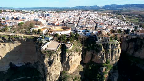 Cliffside-home-and-residences-of-Ronda-Spain-with-high-sun-and-long-shadows